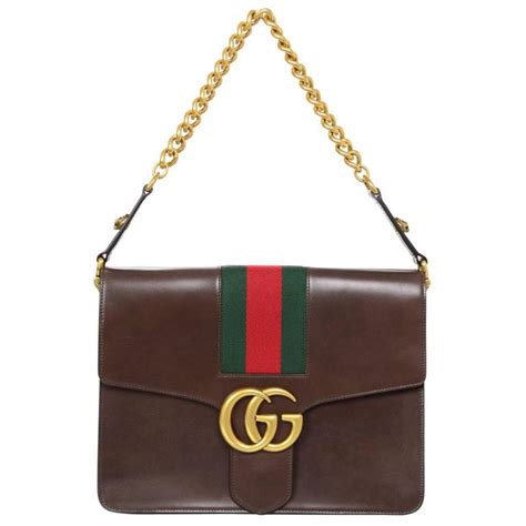 maglie gucci false come riconoscerle|is a gucci bag real.